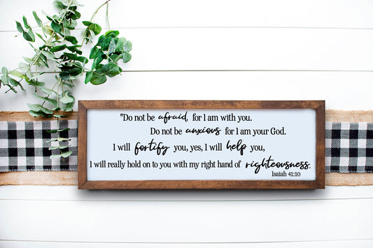 A wooden sign with a black frame, featuring the scripture quote 'Do not be afraid, for I am with you. Do not be anxious, for I am your God.